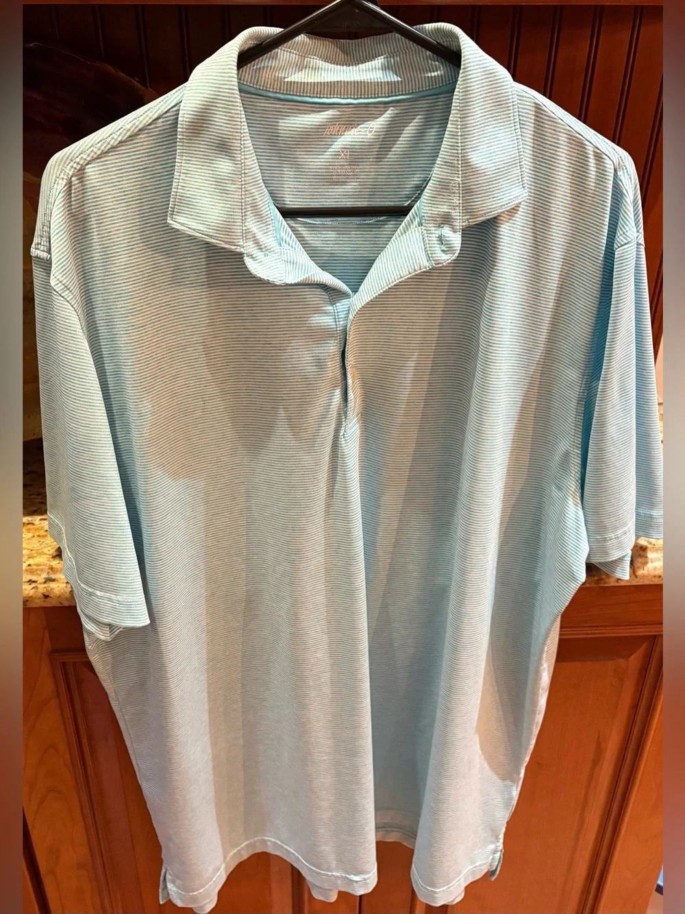 johnnie-O men’s golf polo. Sharp teal/white micro stripe with iconic logo. XL